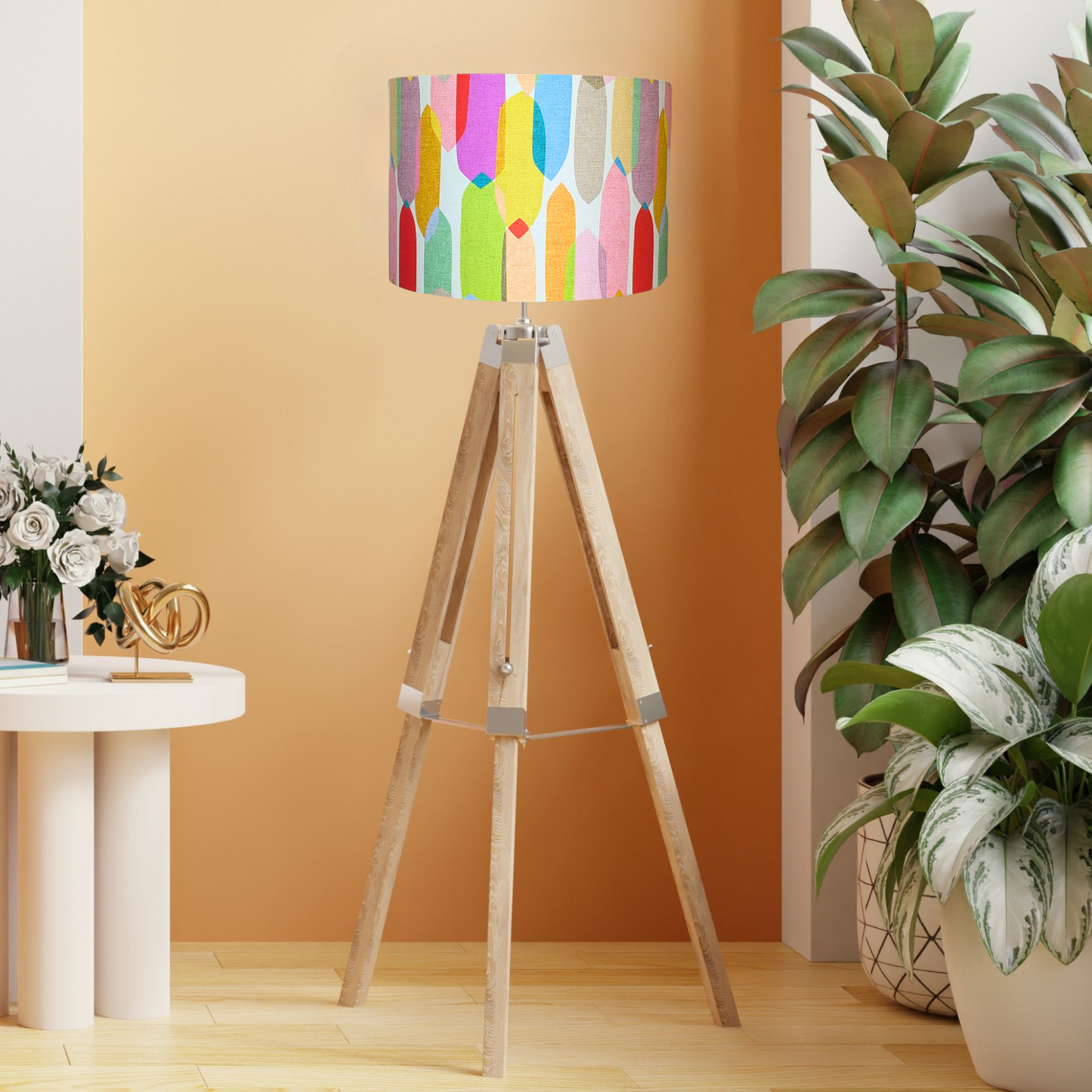 Multi-Colour Mid-Century lampshade by Emotive Collection on a wooden tripod floor lamp base, showcasing vibrant hues and modern geometric designs by Cecilia Mok. Handcrafted with precision in Australia.
