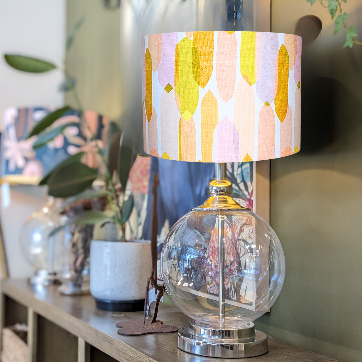 Handmade Mid Century Droplets Ivory lampshade on a glass lamp base, designed by Cecilia Mok. This contemporary piece combines style and sophistication, crafted in Australia.