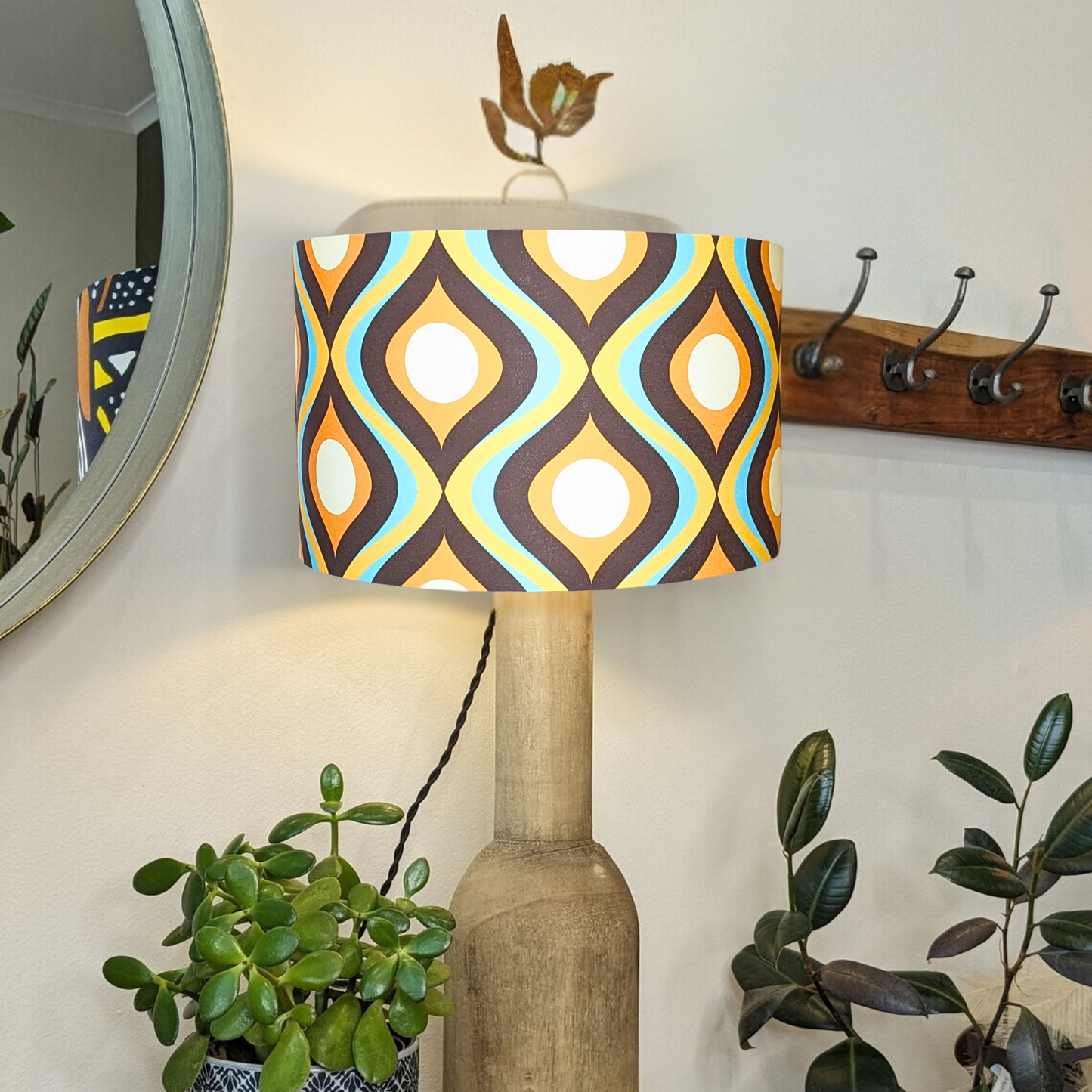 Handmade Retro Ogee design lampshade by Emotive Collection on a wooden lamp base, featuring bold geometric patterns on a contemporary design. Crafted with care in Australia for a unique statement piece.