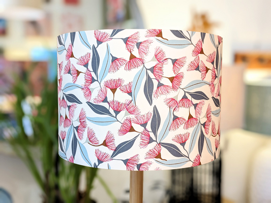 Handmade Gum Blossom design lampshade by Emotive Collection, featuring a stunning artwork by Australian artist Jocelyn Proust. Inspired by native Australian flora, this unique lampshade adds a touch of natural elegance to your home. Crafted with care in A