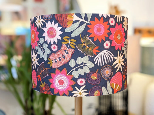 Handmade Banksia Garden lampshade by Emotive Collection, featuring a beautiful design by Australian artist Jocelyn Proust, inspired by the vibrant Australian flora. Crafted with care in Australia.