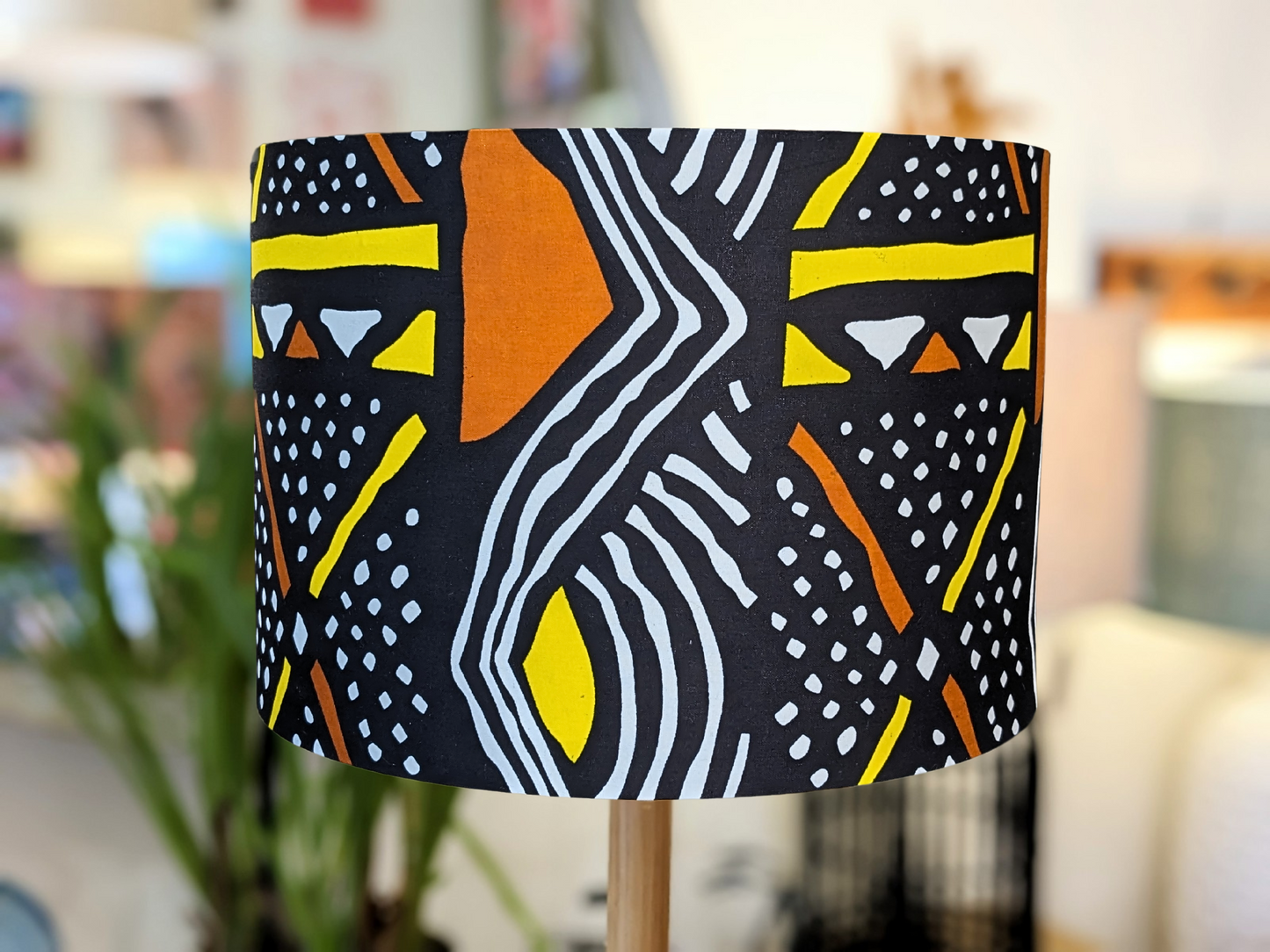 Handmade Mali African lampshade by Emotive Collection, featuring authentic Malinese design on traditional Bogolan mudcloth fabric. This unique, culturally rich lampshade brings a touch of African artistry to your home. Crafted with care in Australia.