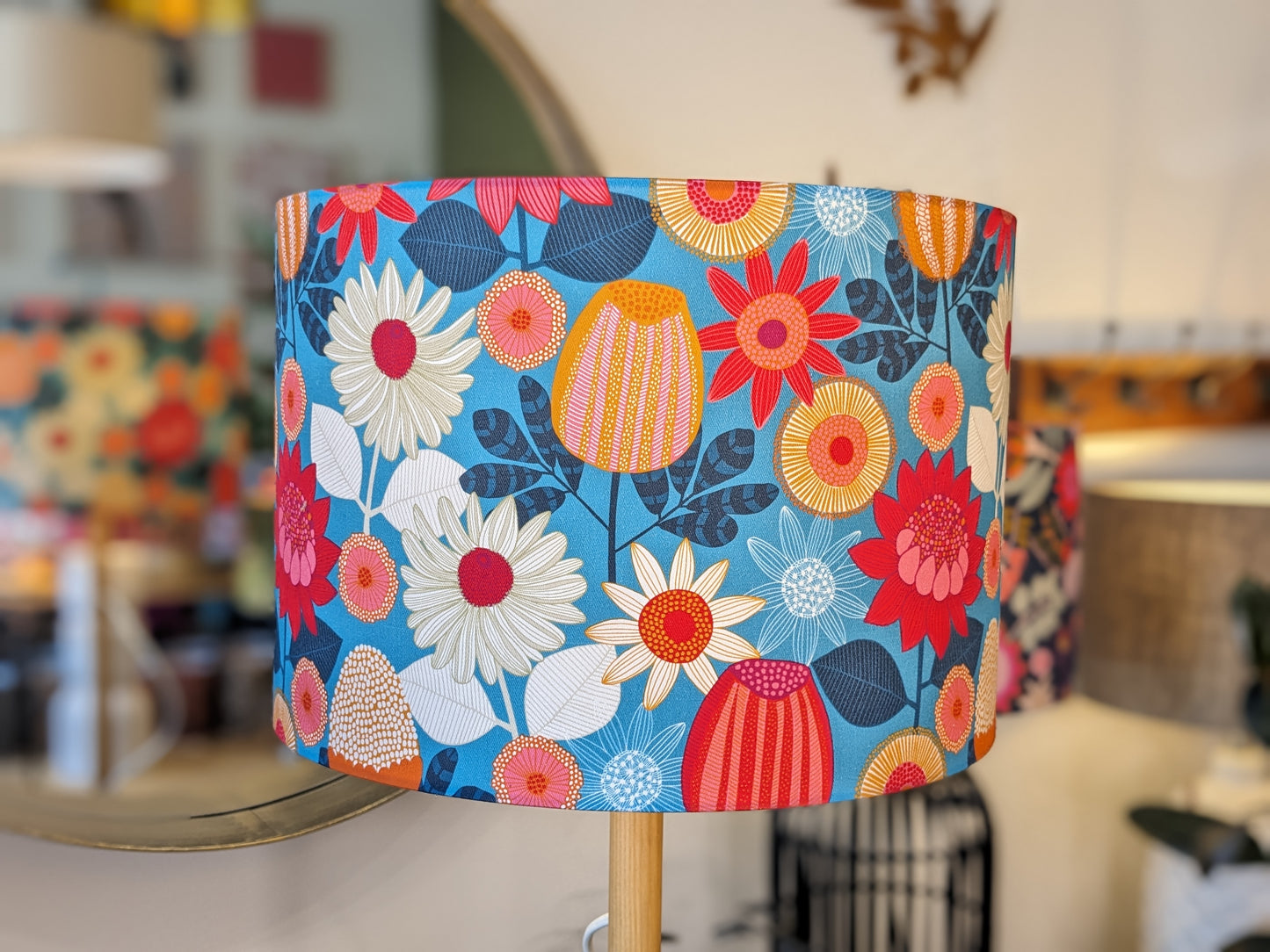 Banksia Grove lampshade by Jocelyn Proust, featuring beautiful Australian Banksia blooms in a bright color palette. Handmade in Australia for a sophisticated and nature-inspired touch.