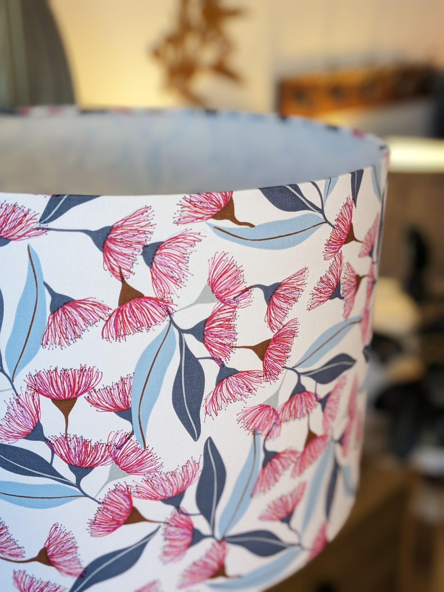 Close-up of the intricate artwork on the Gum Blossom design lampshade, created by Australian artist Jocelyn Proust.
