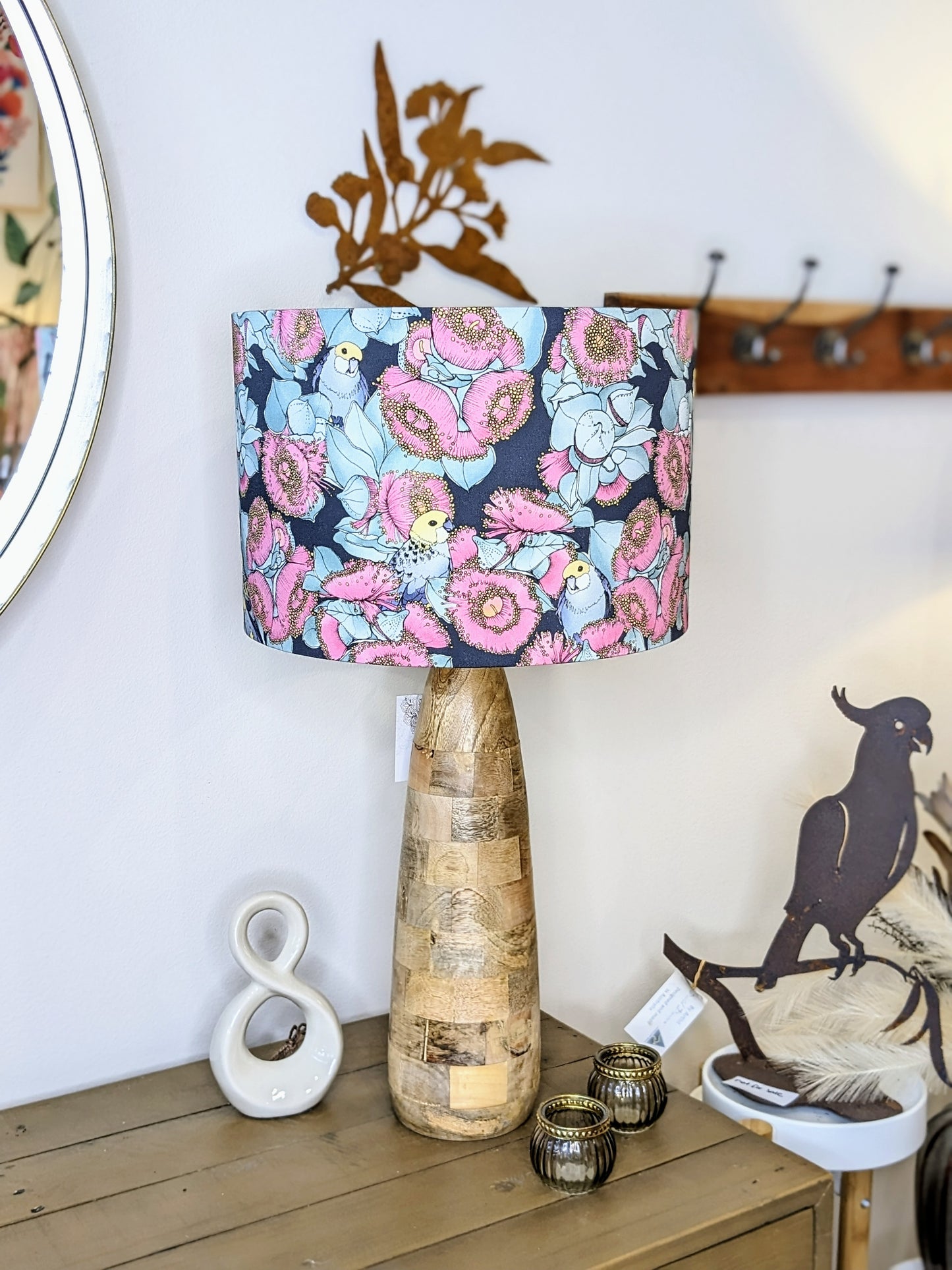 Rosella & Mallee lampshade by Emotive Collection, shown on a wooden lamp base, featuring vibrant Australian flora and fauna designs by Victoria McGrane from The Scenic Route. Handcrafted in Australia for a unique, nature-inspired lighting piece.