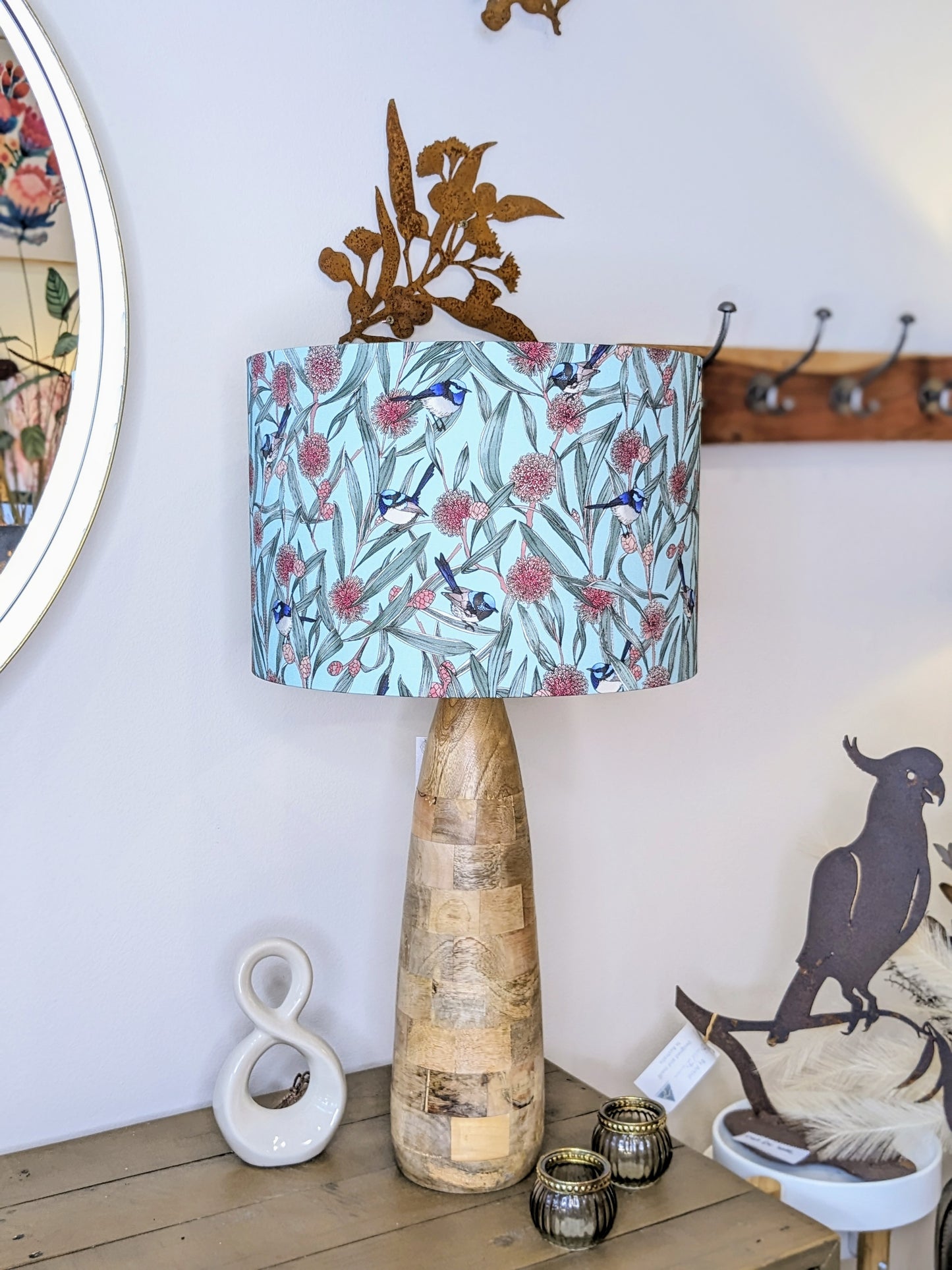Emotive Collection's Blue Wren & Hakea lampshade on a wooden base, with a bright design by Australian artist Victoria McGrane from The Scenic Route. Crafted with care in Australia to add a touch of nature to your home.