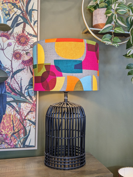 Handmade MCM Midcentury Modern lampshade by Emotive Collection on a Black rattan lamp base, featuring a distinctive design by Australian artist Cecilia Mok. Expertly crafted in Australia to bring mid-century modern flair to your space.
