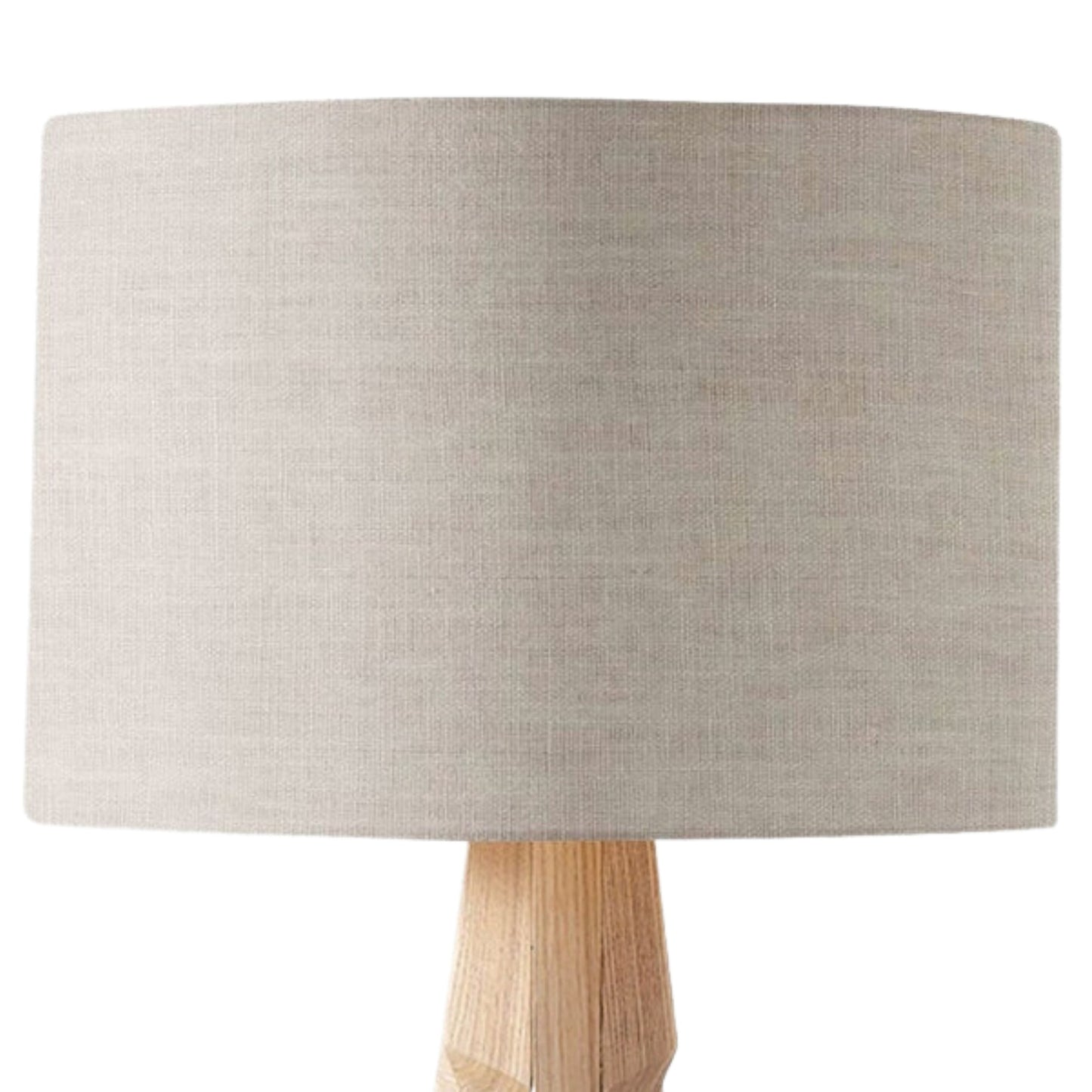 The Emotive Collection’s Stone Premium Linen Lampshade in an earthy hue is paired with a light wooden base, displayed against a white background.