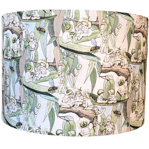 Emotive Collection Handmade Vintage May Gibbs lampshade, showcasing iconic Australian characters like Gumnuts and Snugglepot on a bright yellow background. A charming addition to any room, made with care in Australia.