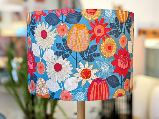 Handmade Banksia Grove lampshade by Emotive Collection, featuring a stunning design by Australian artist Jocelyn Proust, showcasing native Banksia flowers. Crafted with care in Australia.