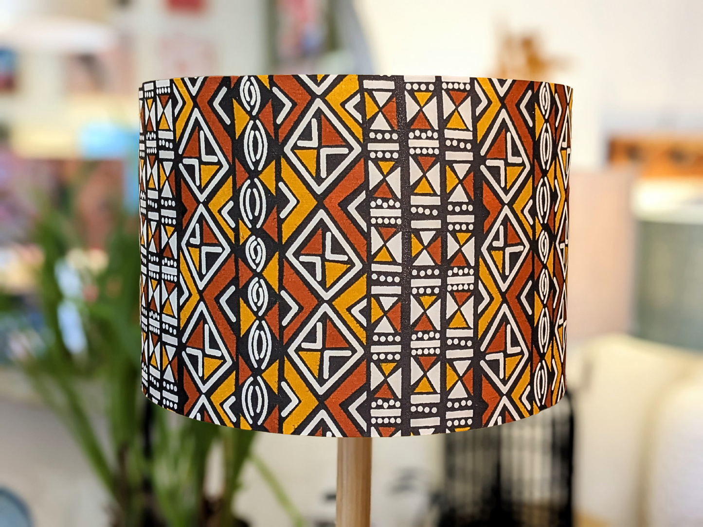 Handmade African Bogolan lampshade by Emotive Collection, crafted from authentic Bogolan mudcloth fabric featuring traditional African patterns. This unique lampshade adds a cultural and artisan touch to your décor. Made with care in Australia.