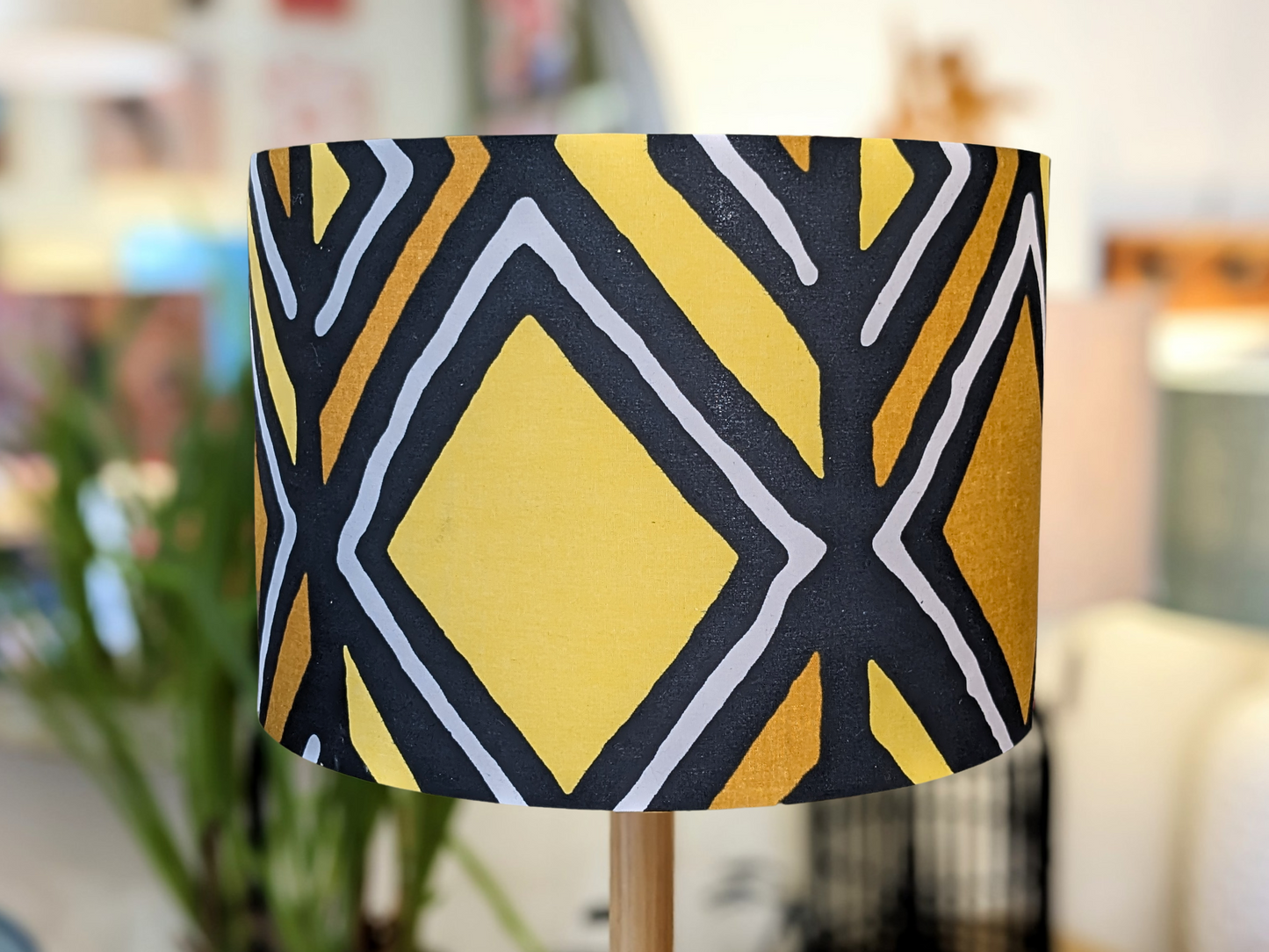Handmade Traditional Mali lampshade by Emotive Collection, featuring a unique Malinese print on authentic Bogolan mudcloth fabric. This culturally rich lampshade brings an artisan touch to your home décor. Crafted with care in Australia.