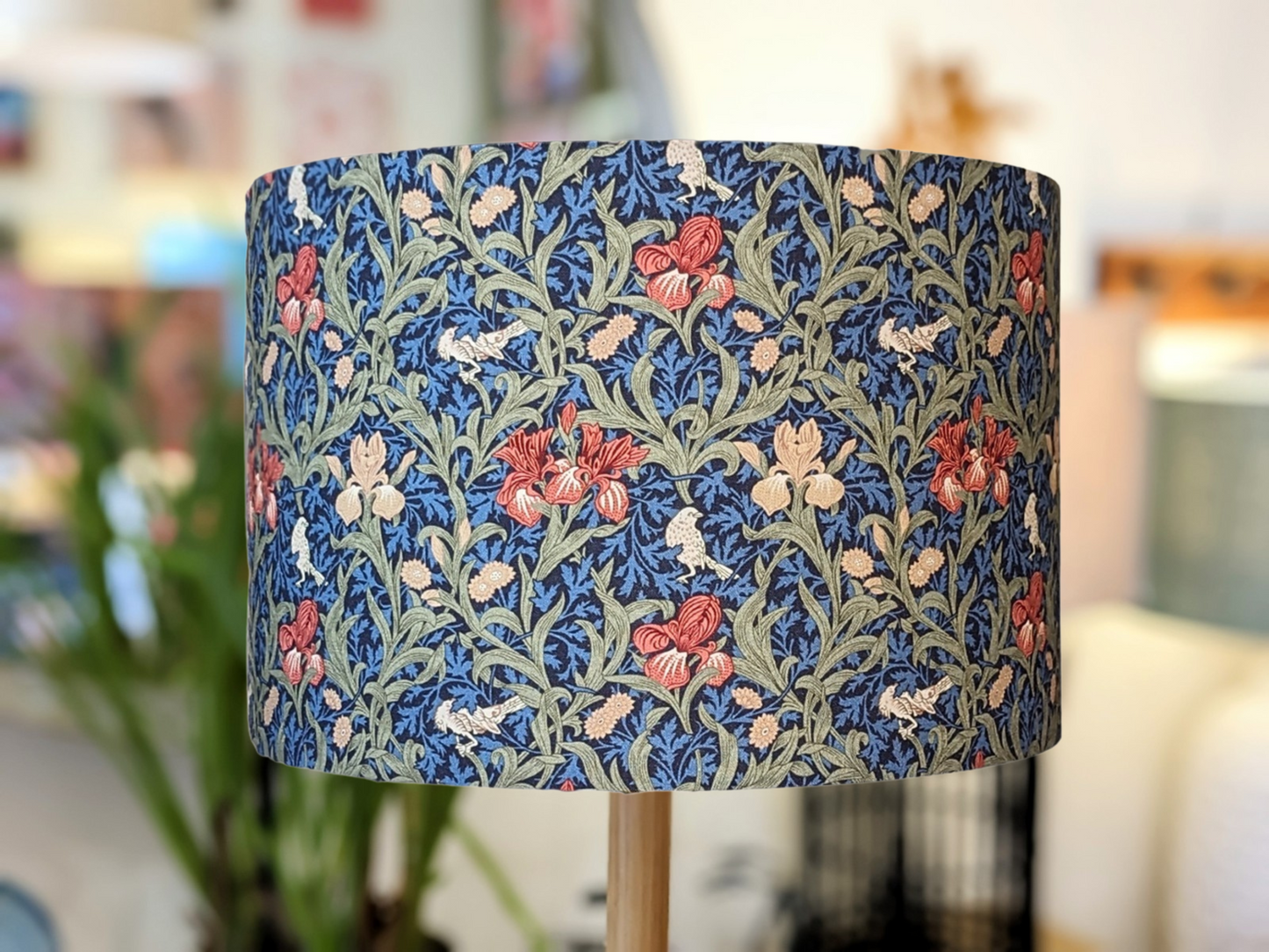 Handmade William Morris Iris lampshade by Emotive Collection, with elegant iris flowers on a blue background. Lampshades made in Australia.