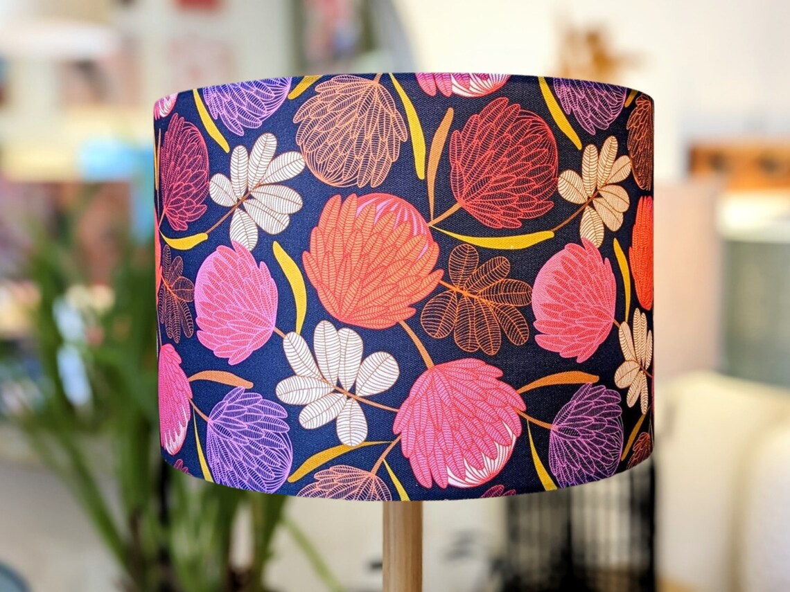 Handmade Midnight Protea lampshade by Emotive Collection, featuring stunning protea flowers on a dark background. Crafted in Australia.