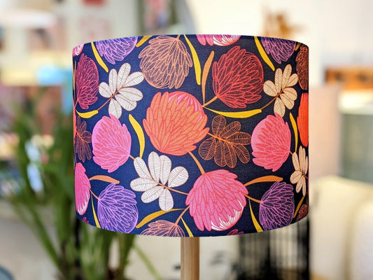 Handmade Midnight Protea lampshade by Emotive Collection, featuring stunning protea flowers on a dark background. Crafted in Australia.