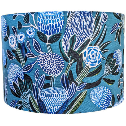 Banksias Blue lampshade with a stunning Banksia flower design in soothing blue tones, created by Australian artist Kirsten Katz. Handmade with care in Australia.