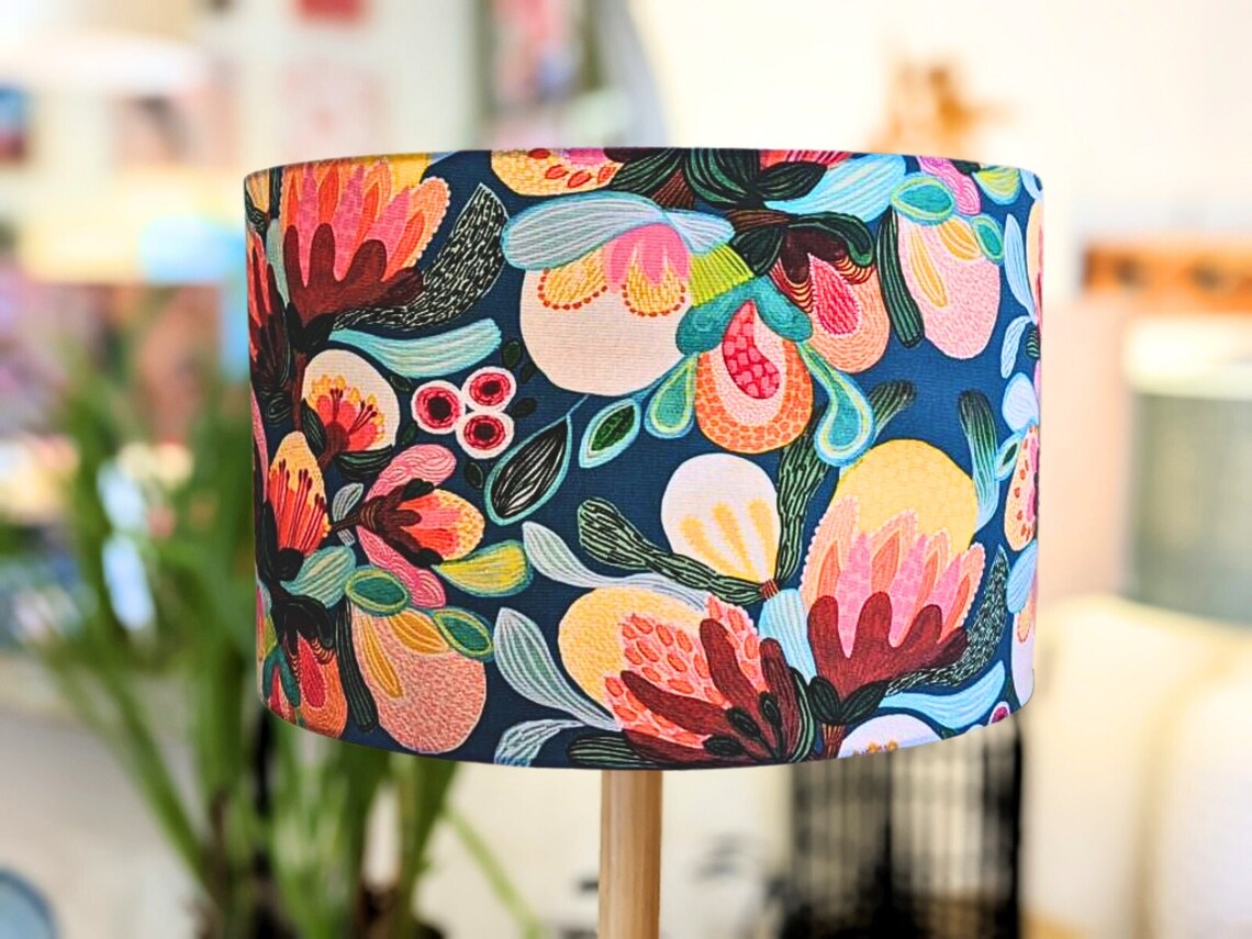 Handmade Midnight Bush lampshade by Emotive Collection, featuring a stunning design by Australian artist Kirsten Katz inspired by native Australian flora. Crafted with care in Australia for a unique and artistic lighting solution.